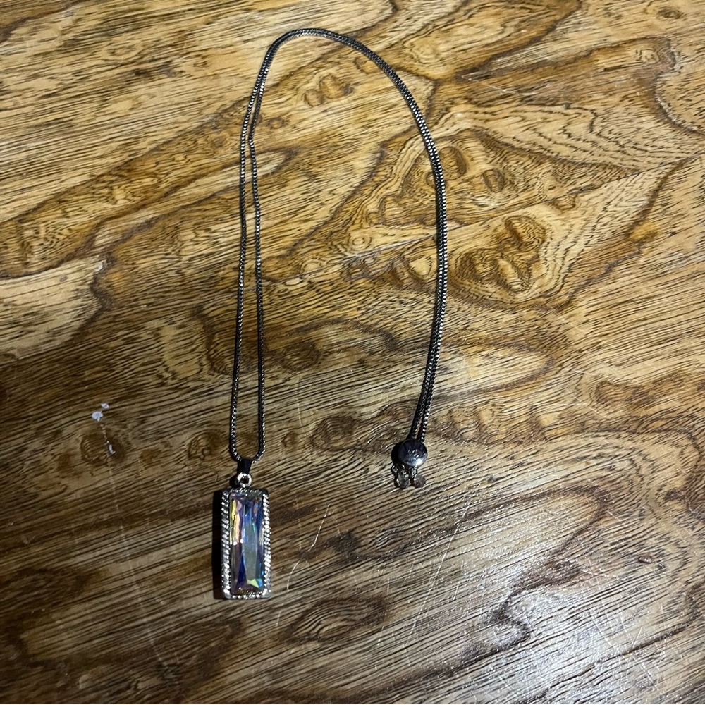 Luca + Danni Hudson iridescent silver necklace.